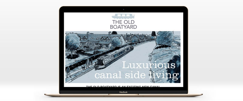 The Old Boatyard Website shown on a macbook